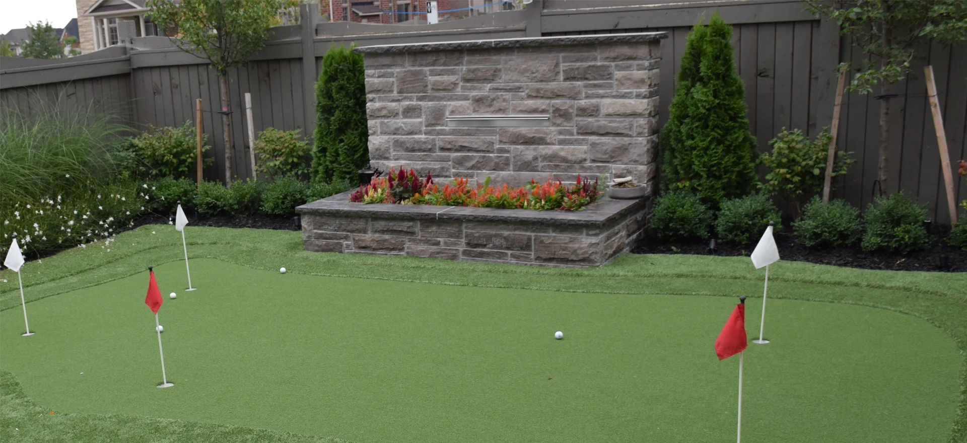 A putting green installed by Elite Courts for our client in the Brampton, Ontario.