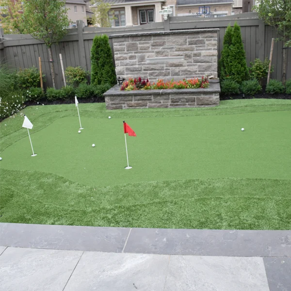 A putting green installed in a client's backyard in the Greater Toronto Area by Elite Courts