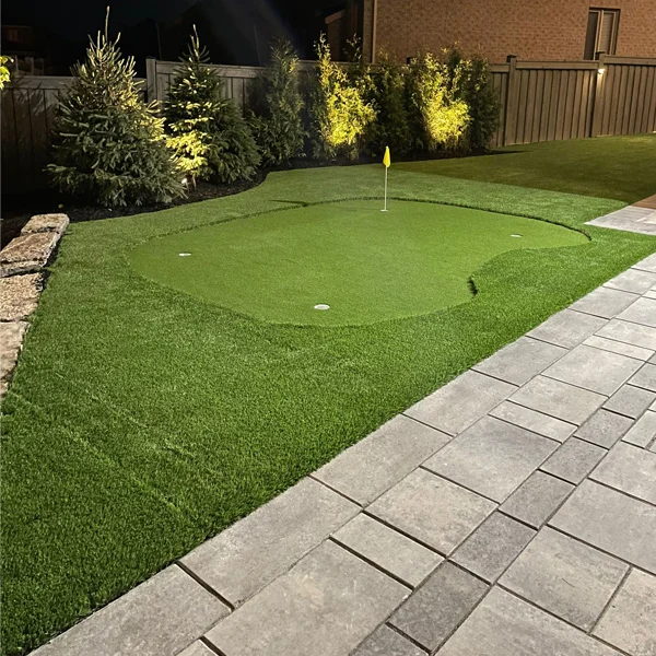 A putting green installed in a client's backyard in the Greater Toronto Area by Elite Courts